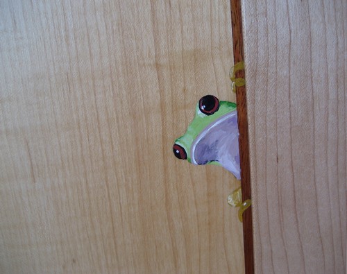 Tree frog painted on cabinet