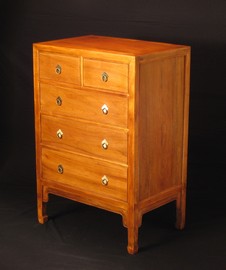 Chest of drawers in elm