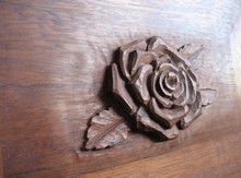 Rose carved on inside of jewelry box lid
