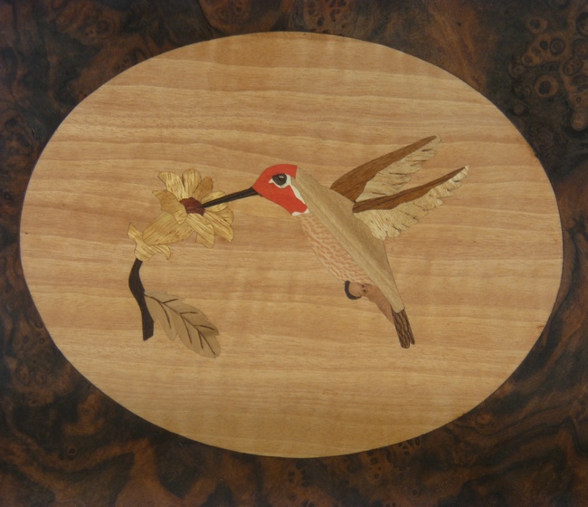 T93 - hummingbird in oval on burl walnut