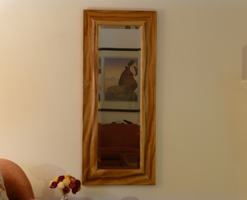 Mirror hung vertivally