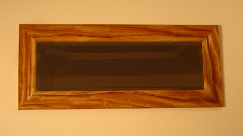 Camphorwood mirror hung horizontally